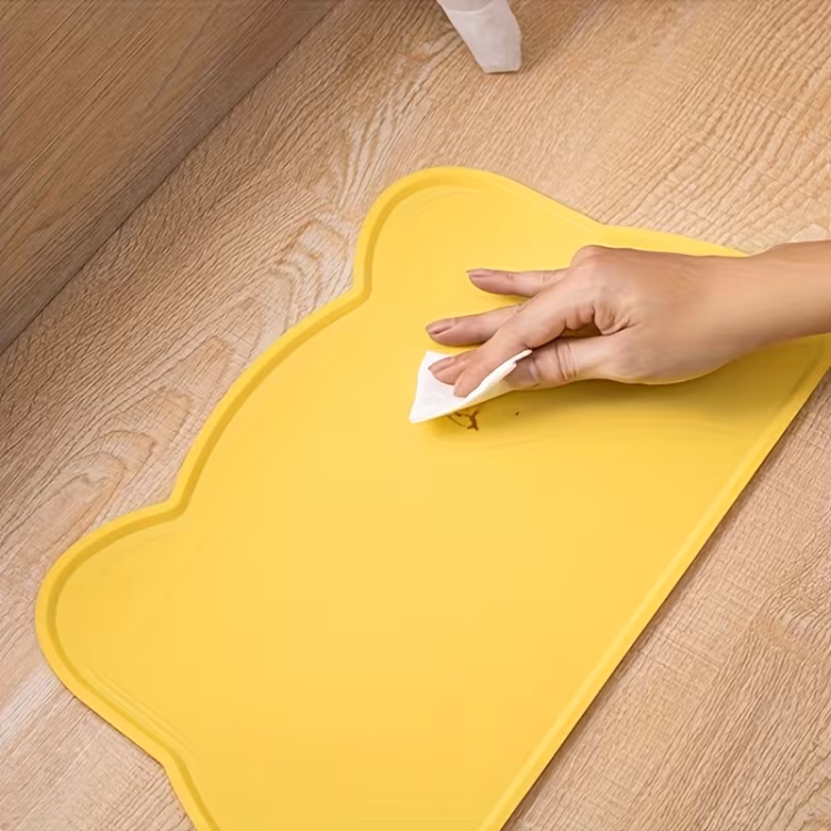سجادة لأطباق طعام القطط من السيليكون لون اصفر