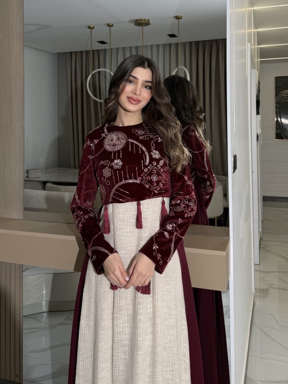 Heavy linen dress paired with a shirred velvet top