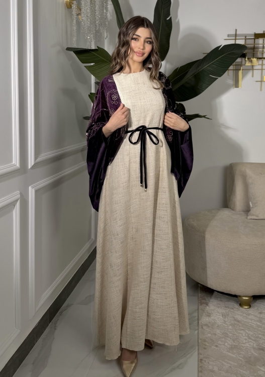 جلابية لينا top ‏Heavy linen dress paired with a shirred velvet 