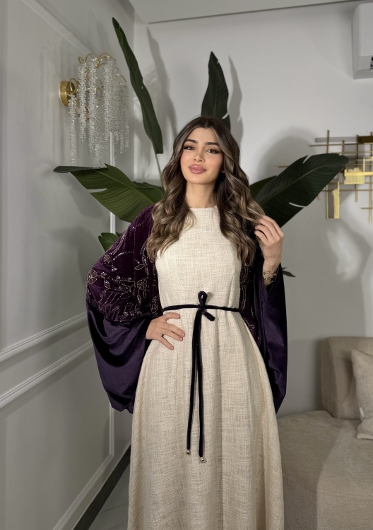 جلابية لينا top ‏Heavy linen dress paired with a shirred velvet 