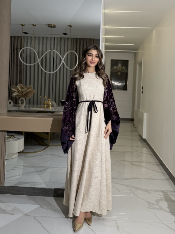 جلابية لينا top ‏Heavy linen dress paired with a shirred velvet 