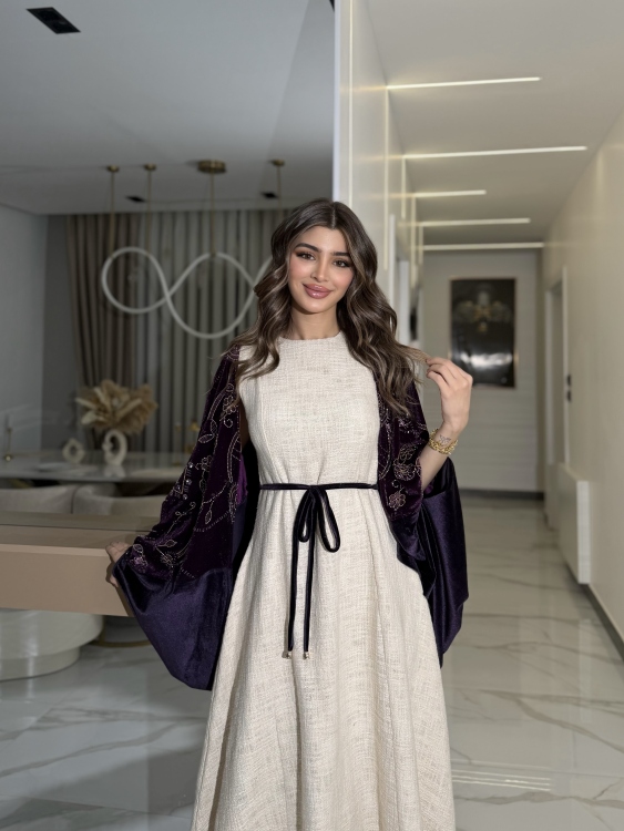 جلابية لينا top ‏Heavy linen dress paired with a shirred velvet 