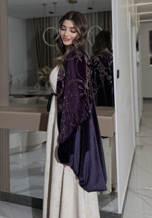 جلابية لينا top ‏Heavy linen dress paired with a shirred velvet 