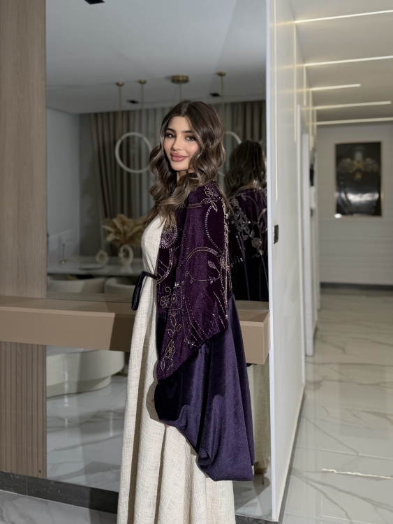 جلابية لينا top ‏Heavy linen dress paired with a shirred velvet 