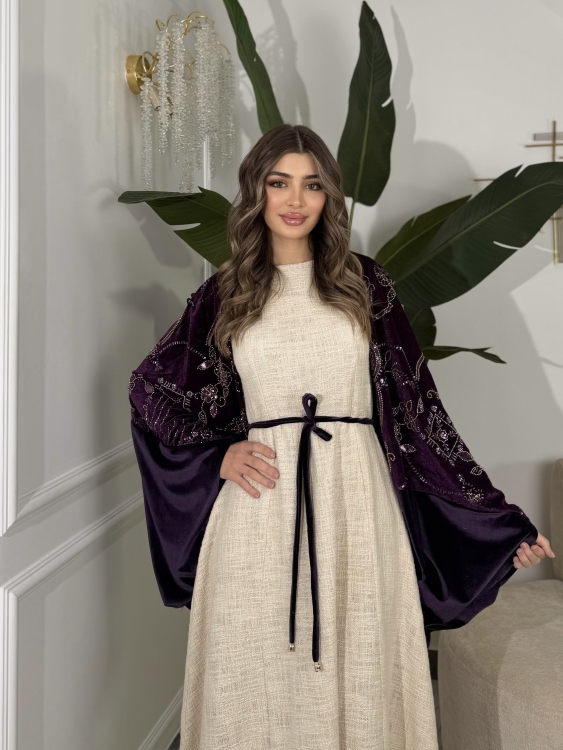 جلابية لينا top ‏Heavy linen dress paired with a shirred velvet 