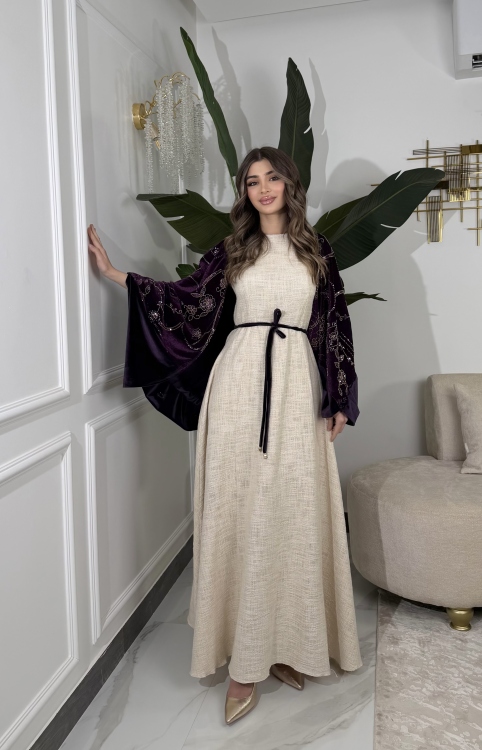 جلابية لينا top ‏Heavy linen dress paired with a shirred velvet 