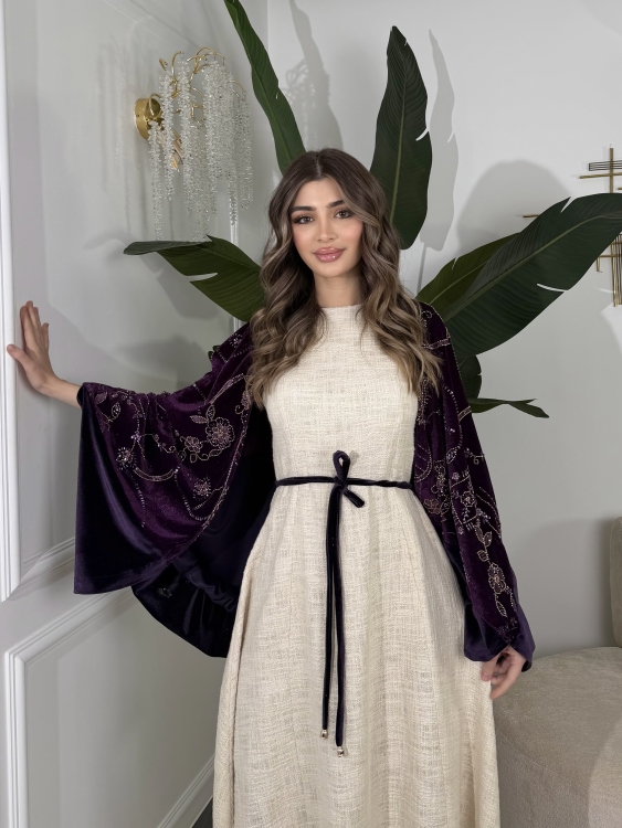 جلابية لينا top ‏Heavy linen dress paired with a shirred velvet 