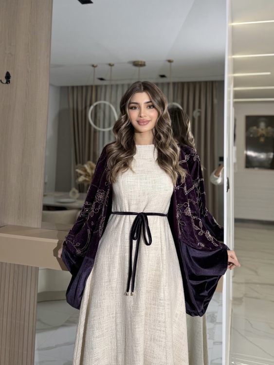 جلابية لينا top ‏Heavy linen dress paired with a shirred velvet 