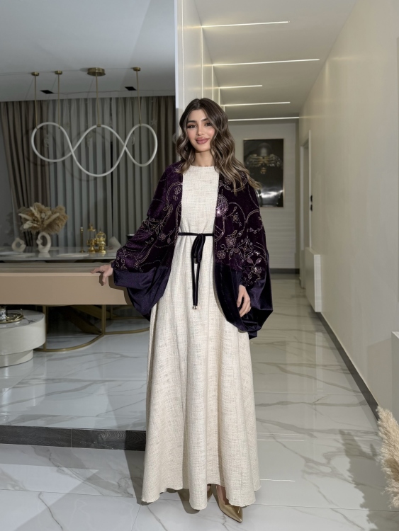 جلابية لينا top ‏Heavy linen dress paired with a shirred velvet 