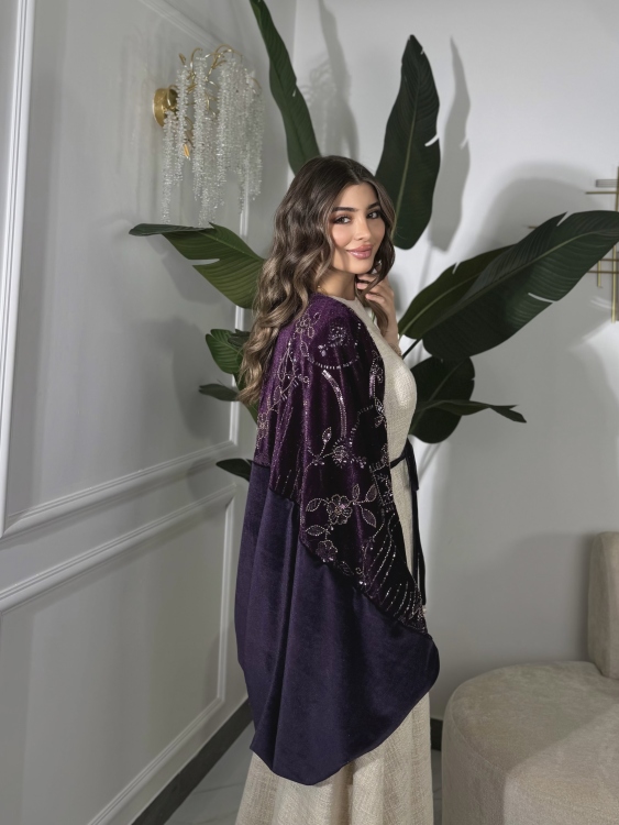 جلابية لينا top ‏Heavy linen dress paired with a shirred velvet 