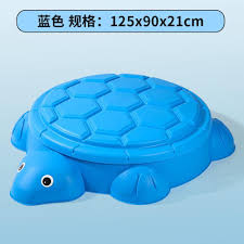 حوض الرمل والماء على شكل سلحفاة