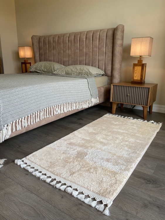 Puffy beige rug 