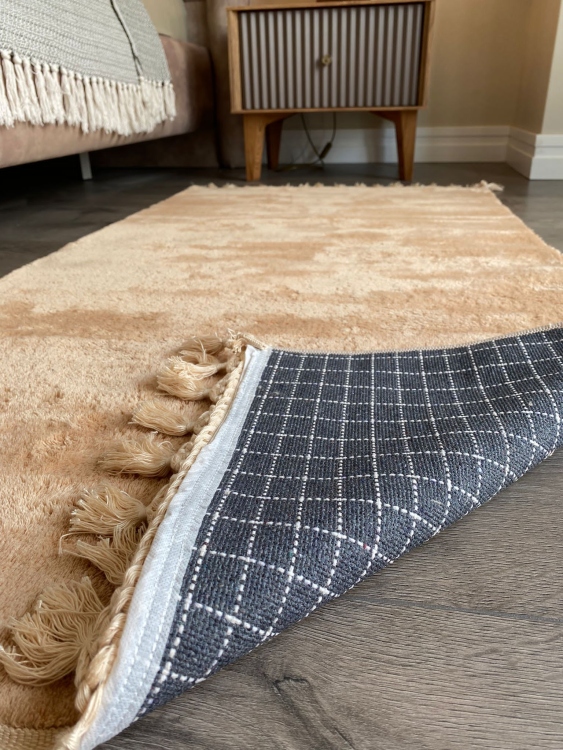 Puffy brown rug
