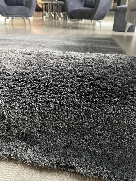 This rug is Microfiber produced with polyester thread with high technology with its super soft button and dust-free feature.