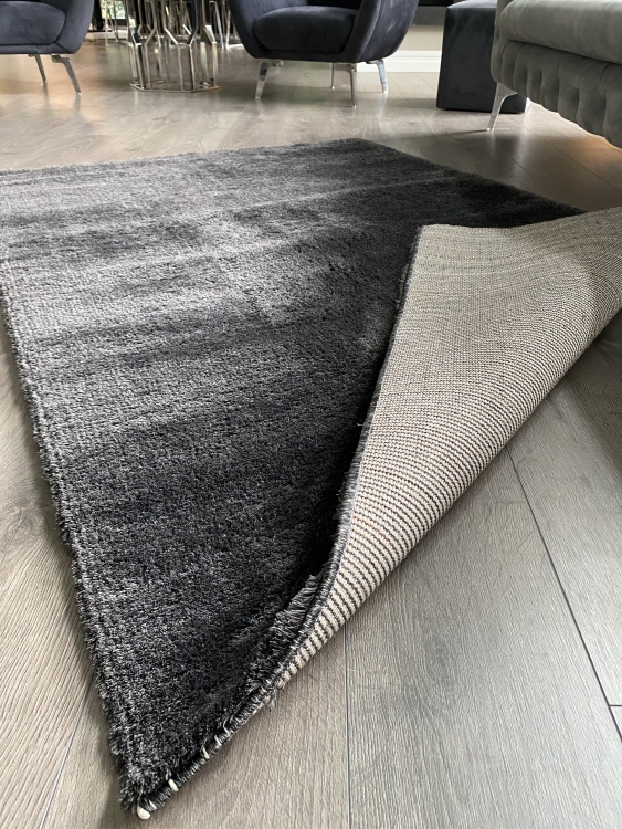 This rug is Microfiber produced with polyester thread with high technology with its super soft button and dust-free feature.