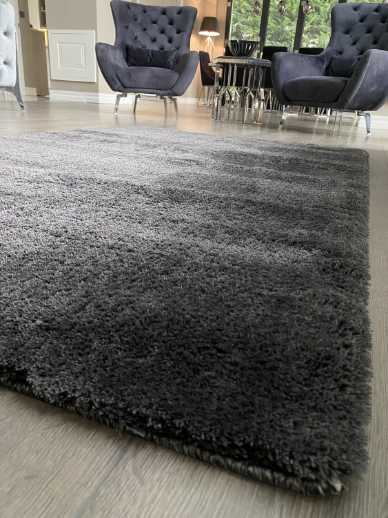 This rug is Microfiber produced with polyester thread with high technology with its super soft button and dust-free feature.