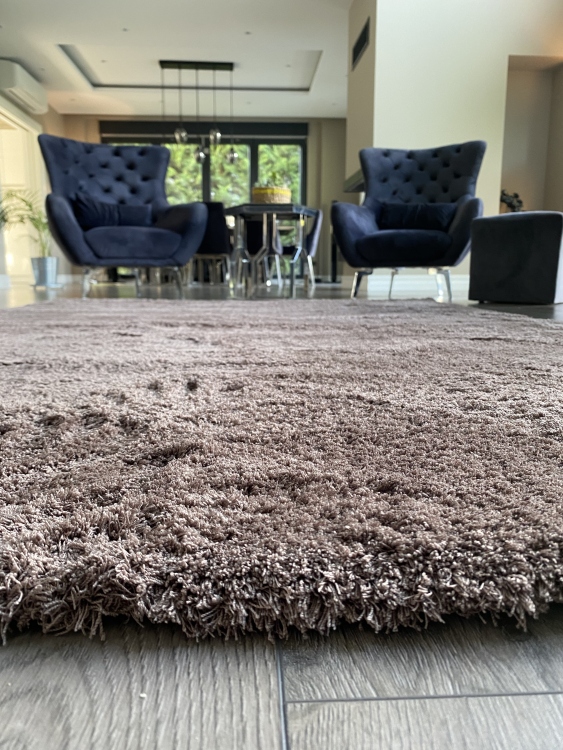 This rug is Microfiber produced with polyester thread with high technology with its super soft button and dust-free feature.