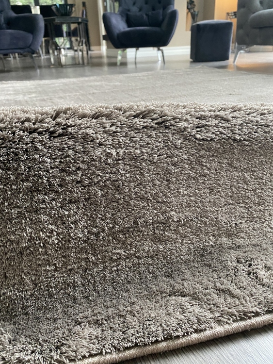 This rug is Microfiber produced with polyester thread with high technology with its super soft button and dust-free feature.