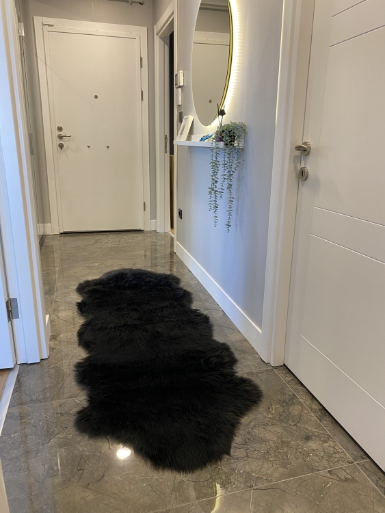 Shaggy black rug