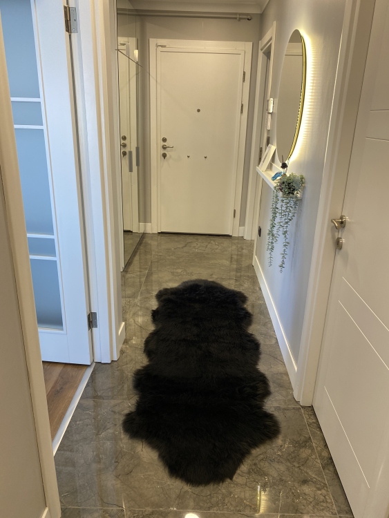 Shaggy black rug
