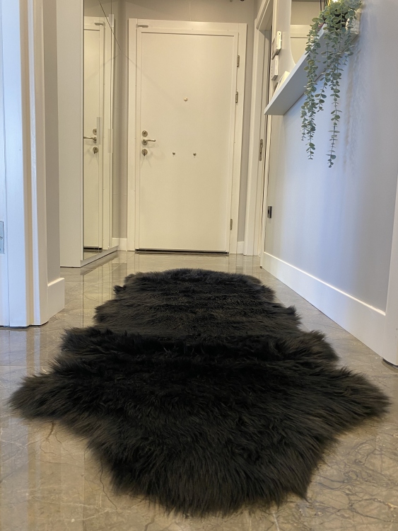 Shaggy black rug