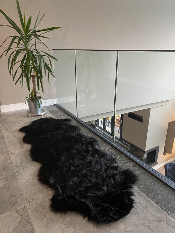 Shaggy black rug