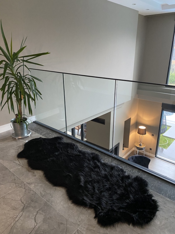 Shaggy black rug