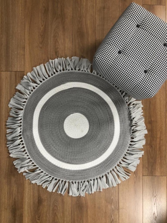 Experience the luxurious feel of a handmade natural jute rug with its high-quality fibers and unique designs.