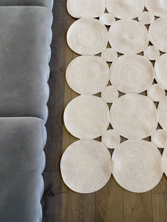 Experience the luxurious feel of a handmade natural jute rug with its high-quality fibers and unique designs.