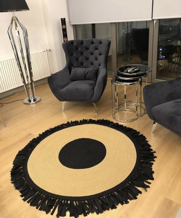Experience the luxurious feel of a handmade natural jute rug with its high-quality fibers and unique designs.