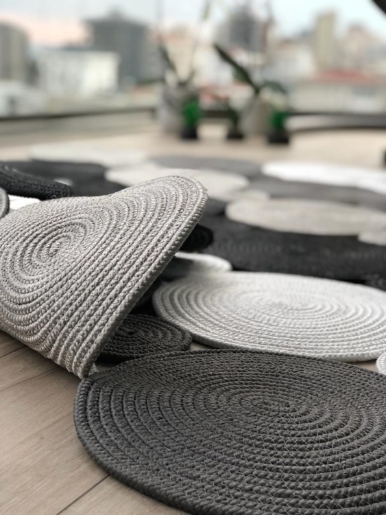 Experience the luxurious feel of a handmade natural jute rug with its high-quality fibers and unique designs.