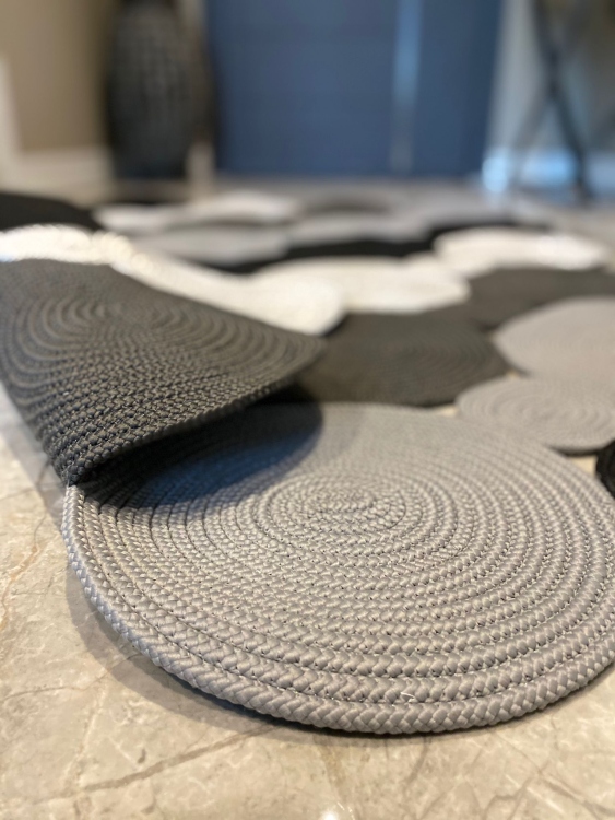 Experience the luxurious feel of a handmade natural jute rug with its high-quality fibers and unique designs.