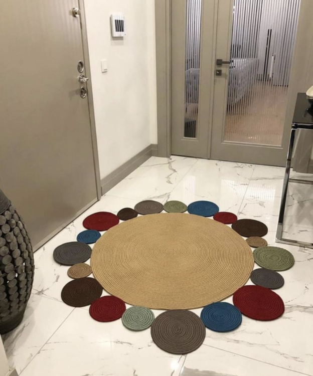 Experience the luxurious feel of a handmade natural jute rug with its high-quality fibers and unique designs.