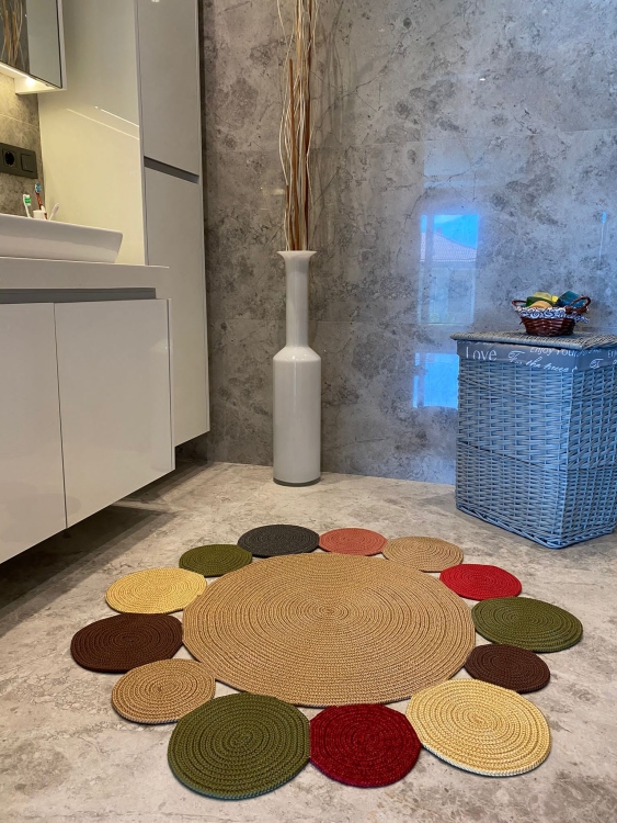 Experience the luxurious feel of a handmade natural jute rug with its high-quality fibers and unique designs.