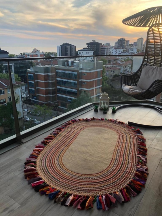 Experience the luxurious feel of a handmade natural jute rug with its high-quality fibers and unique designs. .