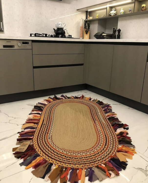 Experience the luxurious feel of a handmade natural jute rug with its high-quality fibers and unique designs. .