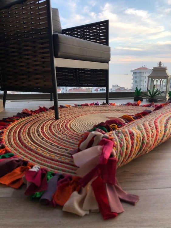 Experience the luxurious feel of a handmade natural jute rug with its high-quality fibers and unique designs.