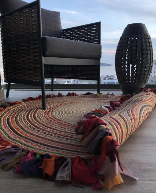 Experience the luxurious feel of a handmade natural jute rug with its high-quality fibers and unique designs.