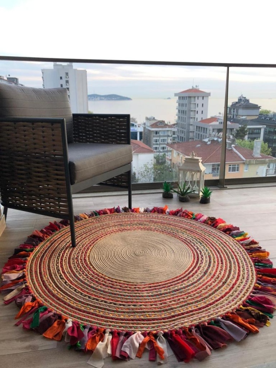 Experience the luxurious feel of a handmade natural jute rug with its high-quality fibers and unique designs.