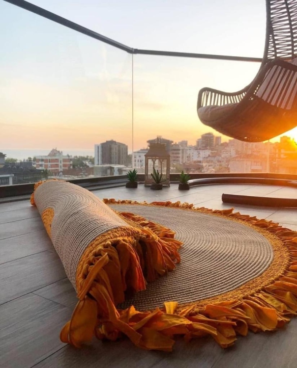 Experience the luxurious feel of a handmade natural jute rug with its high-quality fibers and unique designs.