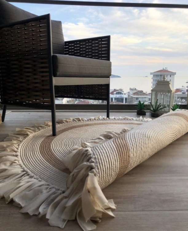 Experience the luxurious feel of a handmade natural jute rug with its high-quality fibers and unique designs.