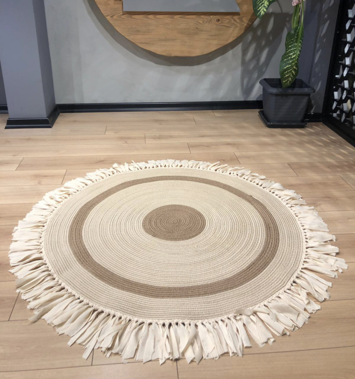 Experience the luxurious feel of a handmade natural jute rug with its high-quality fibers and unique designs.