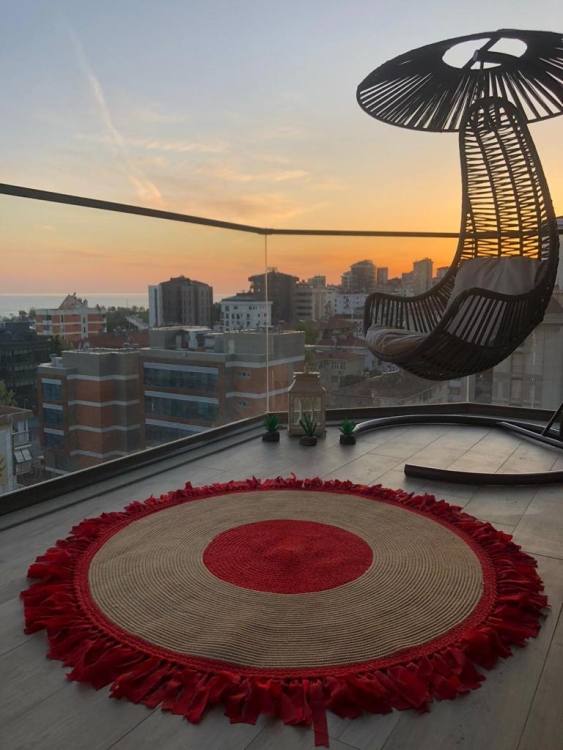 Experience the luxurious feel of a handmade natural jute rug with its high-quality fibers and unique designs.