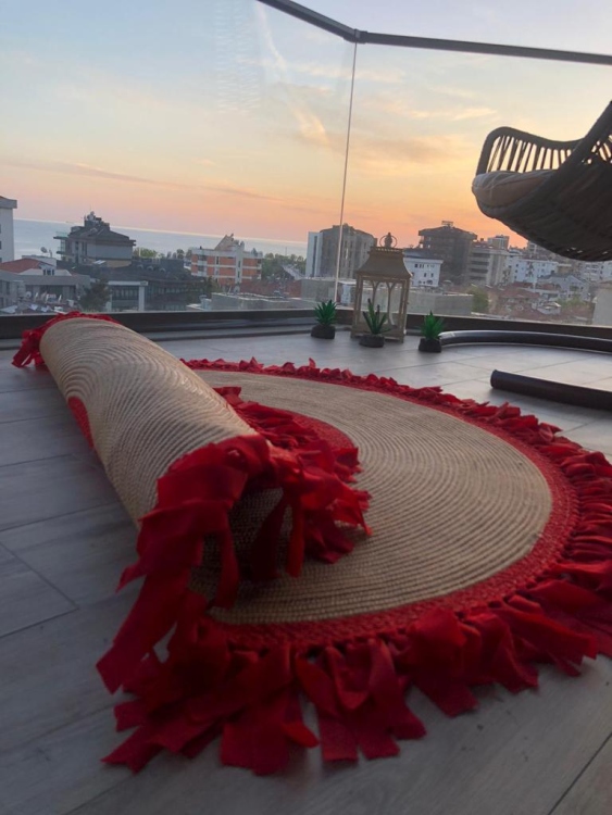 Experience the luxurious feel of a handmade natural jute rug with its high-quality fibers and unique designs.