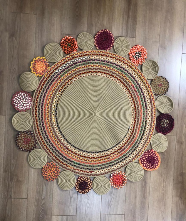 Experience the luxurious feel of a handmade natural jute rug with its high-quality fibers and unique designs.