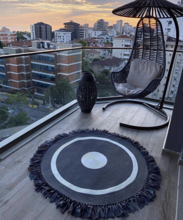 Experience the luxurious feel of a handmade natural jute rug with its high-quality fibers and unique designs.