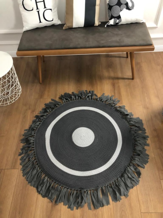 Experience the luxurious feel of a handmade natural jute rug with its high-quality fibers and unique designs.