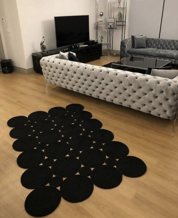 Experience the luxurious feel of a handmade natural jute rug with its high-quality fibers and unique designs.