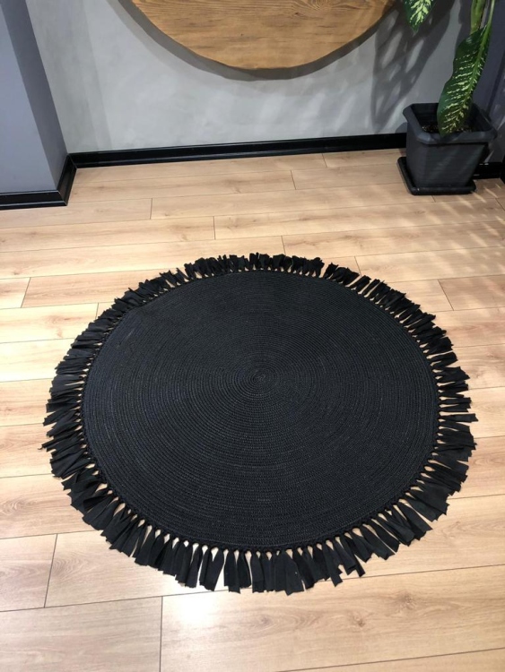 Experience the luxurious feel of a handmade natural jute rug with its high-quality fibers and unique designs.