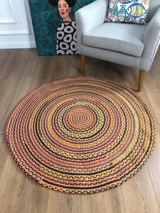 Experience the luxurious feel of a handmade natural jute rug with its high-quality fibers and unique designs.